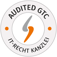 Kuvassa näkyy IT-Recht-Kanzlein pyöreä logo keltaisella ja valkoisella, tekstillä ”AUDITED GTC”.