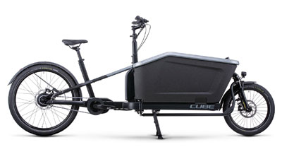 Esillä on harmaa Cube Cargo Hybrid 500 -lastipyörä.