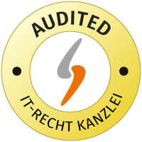 Kuvassa näkyy IT-Recht-Kanzlein pyöreä logo keltaisella ja valkoisella värillä, tekstillä AUDITED.